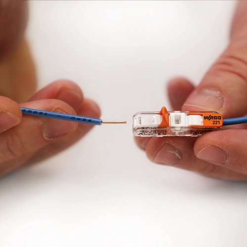 221-2401 | WAGO Lever-Nuts® Inline Splicing Connector | for Solid and Stranded Conductors | 2-Conductor with Operating levers | 24-12 AWG | Transparent housing | White Cover | [Box of 60 Pieces]